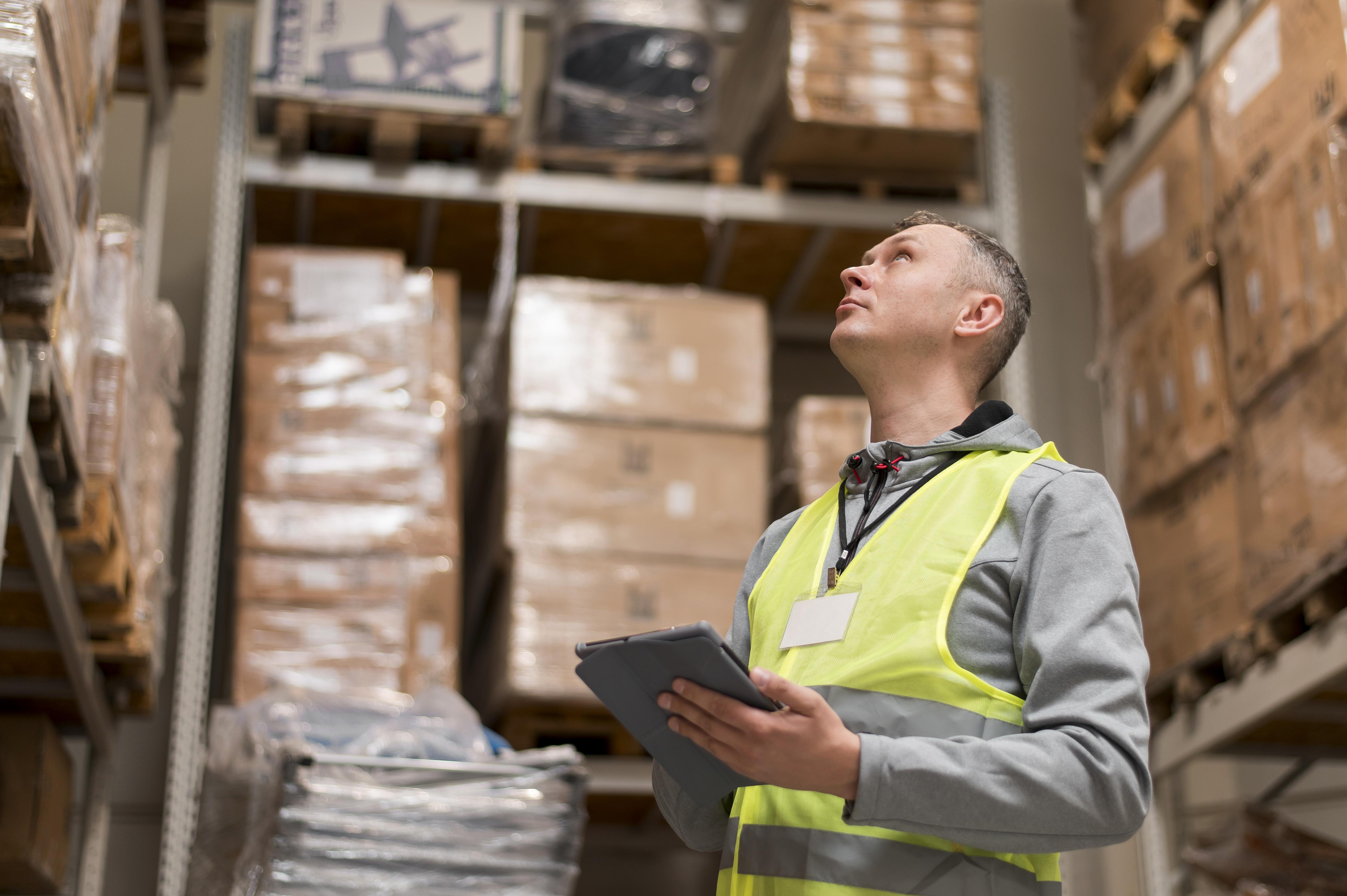medium shot man holding tablet 1 - Supply Chain Resilience: Why Real-Time Data Is the New Advantage in Uncertain Markets